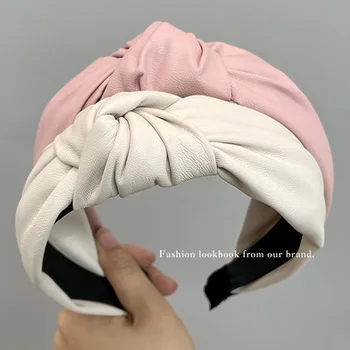 Moda nova versão coreana de cor pura das mulheres simples e criativas cruz-nó de cabeça de atacado